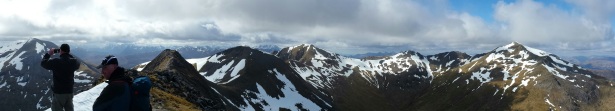 Panoramic view from the summit of An Gearanach. The other 3 Munros in view with the Glen Coe mountains in the distance.