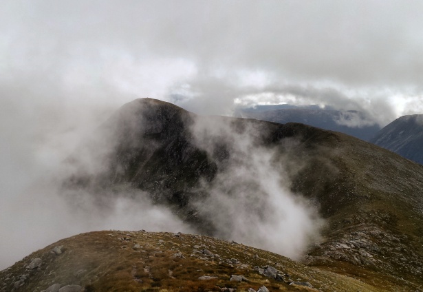 Descending towards to bealach between the three Munros. Glas Bheinn Mhor in front.